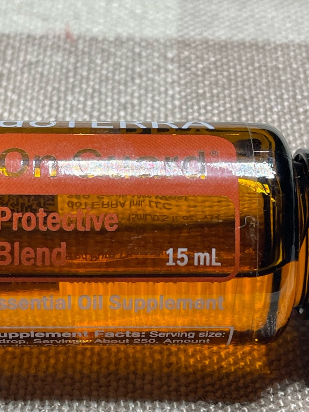Doterra On Guard Essential Oil Bottle with Orange Label and Black Cap - Picture 5 of 5